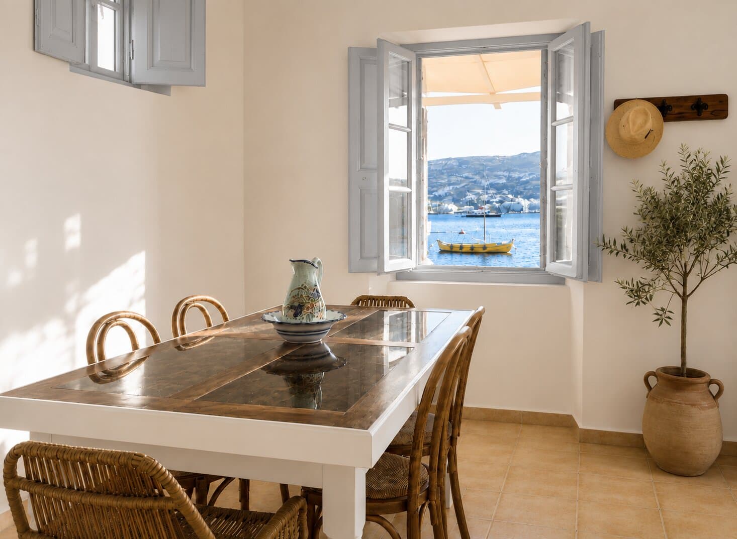 The window onto Grikos Bay from the En Plo dining table